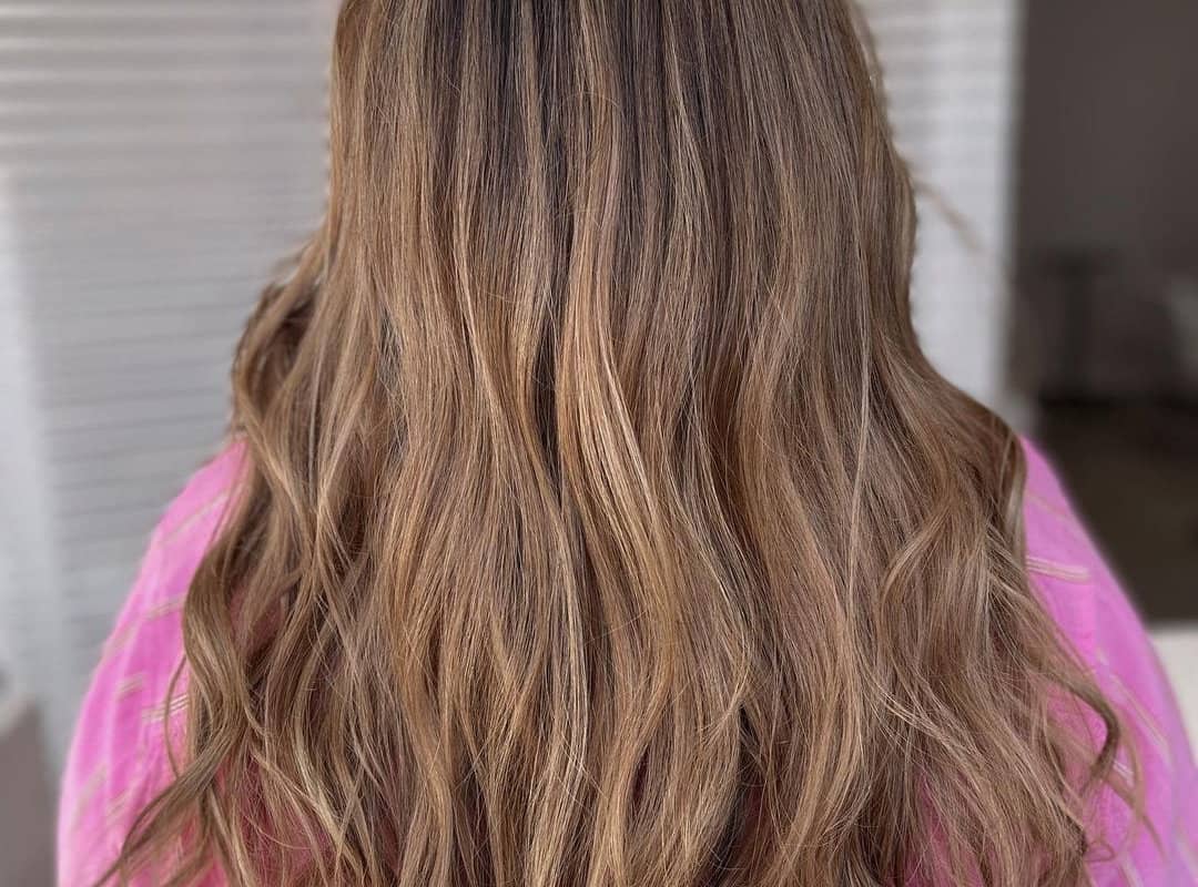 pastel caramel balayage on Asian hair